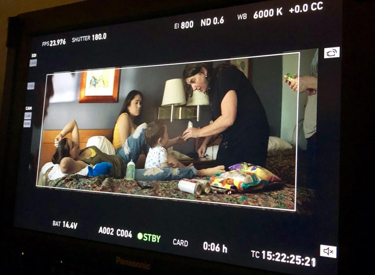 http://A%20close-up%20of%20a%20monitor%20screen%20as%20a%20filmmaker%20and%20actors,%20including%20a%20baby,%20shoot%20a%20scene%20in%20a%20hotel%20room.